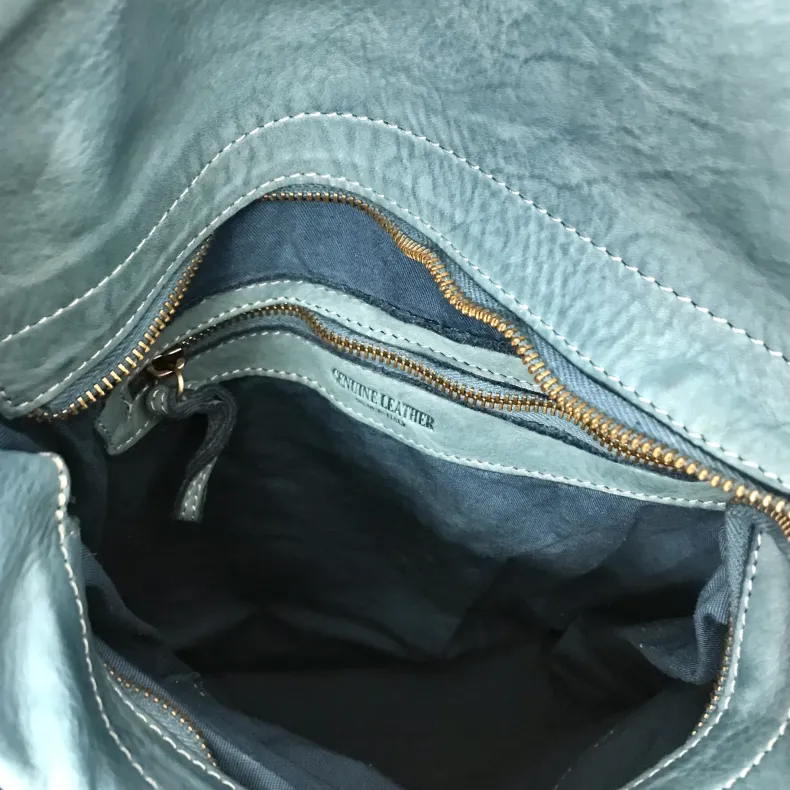 Handmade Backpack In Washed And Woven Leather