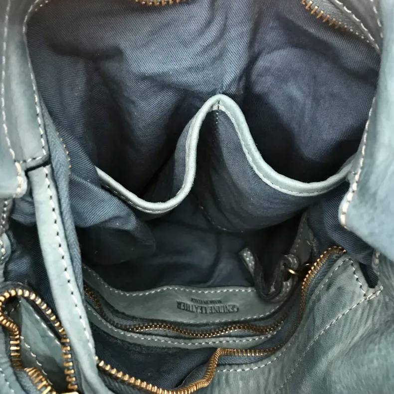 Handmade Backpack In Washed And Woven Leather