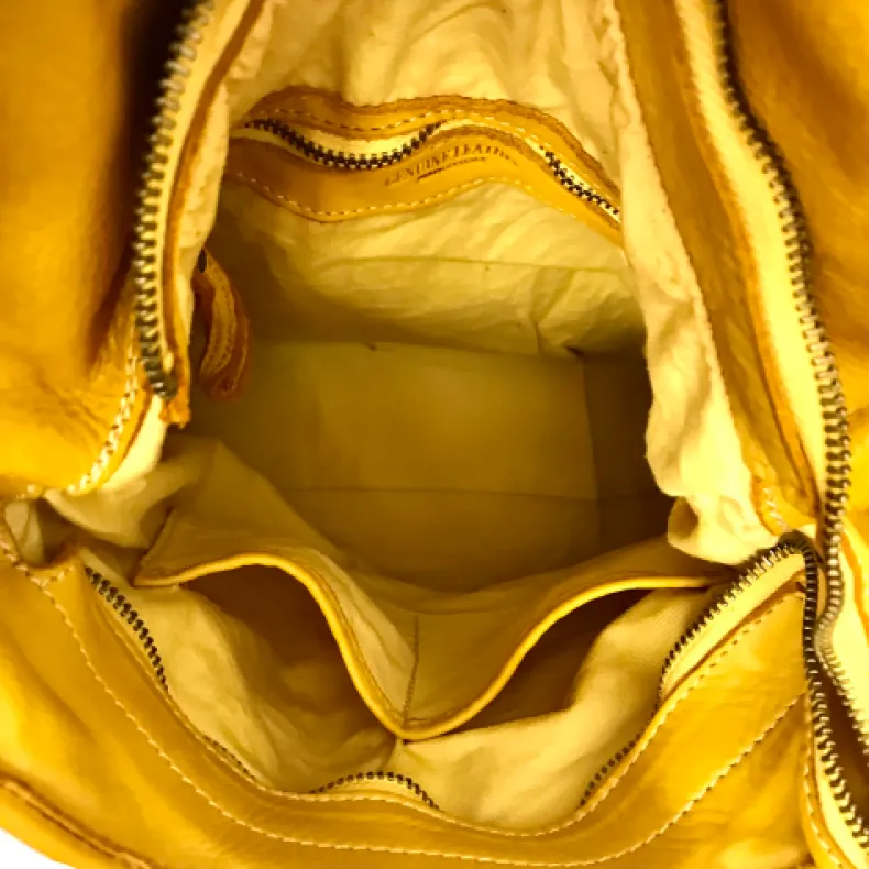 Handmade Backpack In Washed And Woven Leather